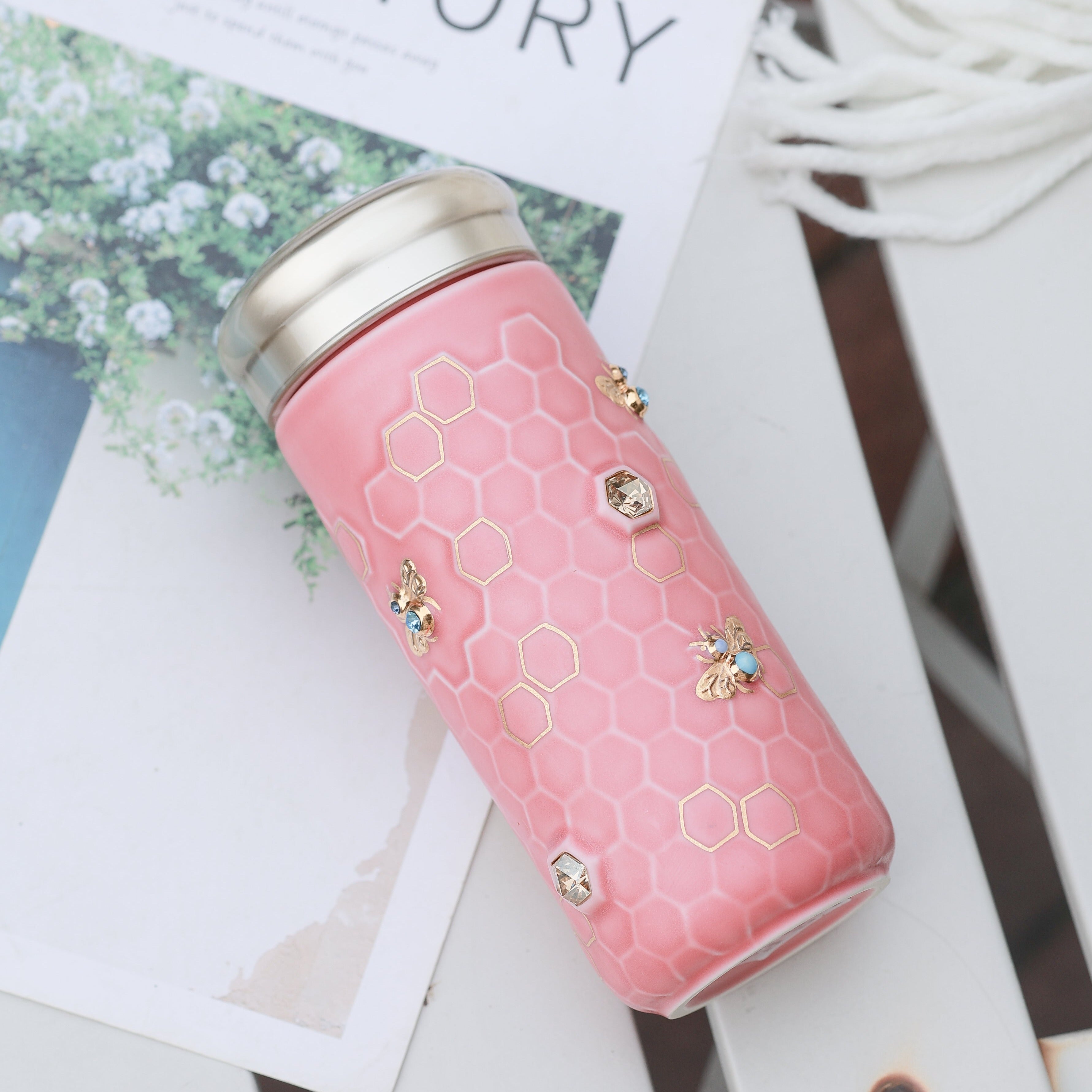 Crystal-studded ceramic travel container